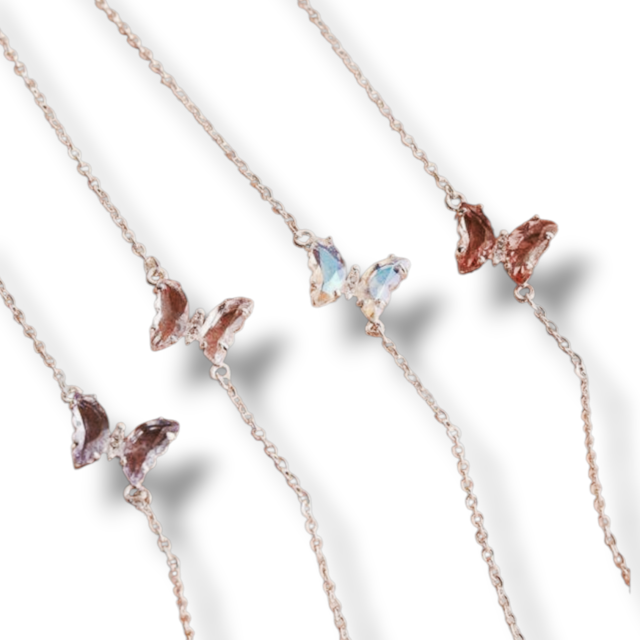 PULSERA ACERO BLANCO DIJE MARIPOSA CRISTAL COLOR SURTIDO 