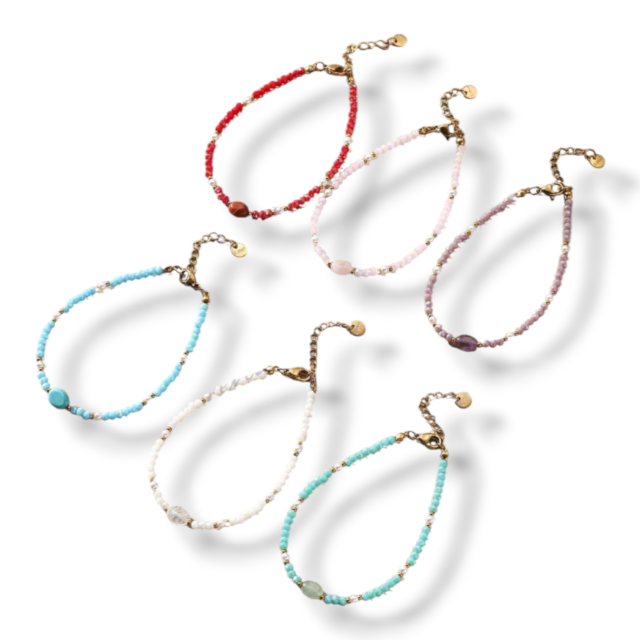 PULSERA ACERO DORADO CRISTALES Y PIEDRA